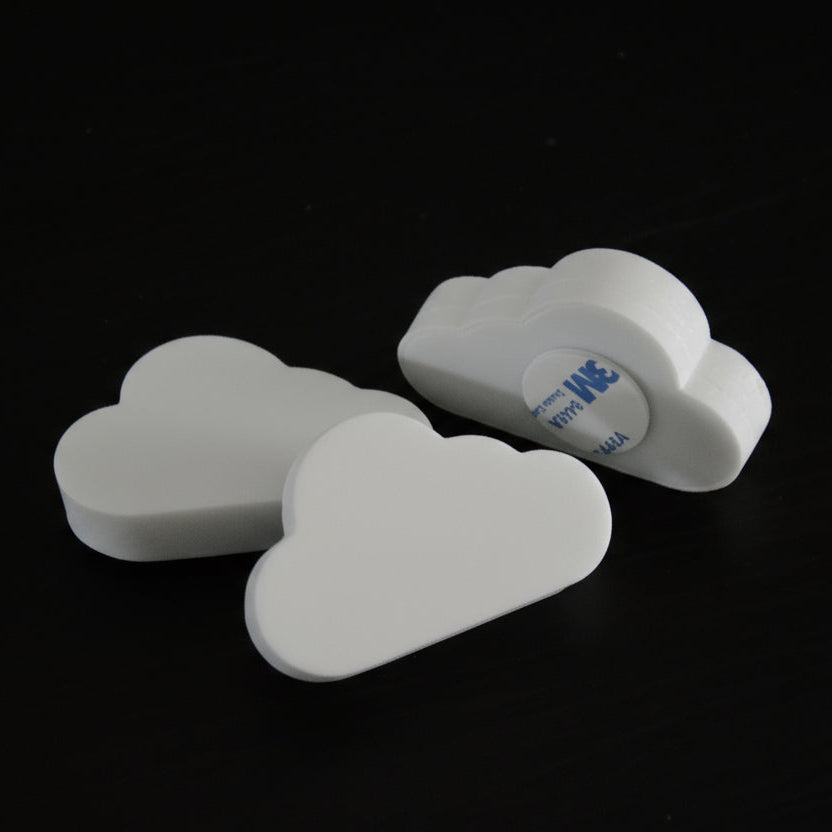 Dørstoppere i skum, formet som skyer