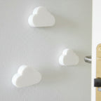 Dørstoppere i skum, formet som skyer